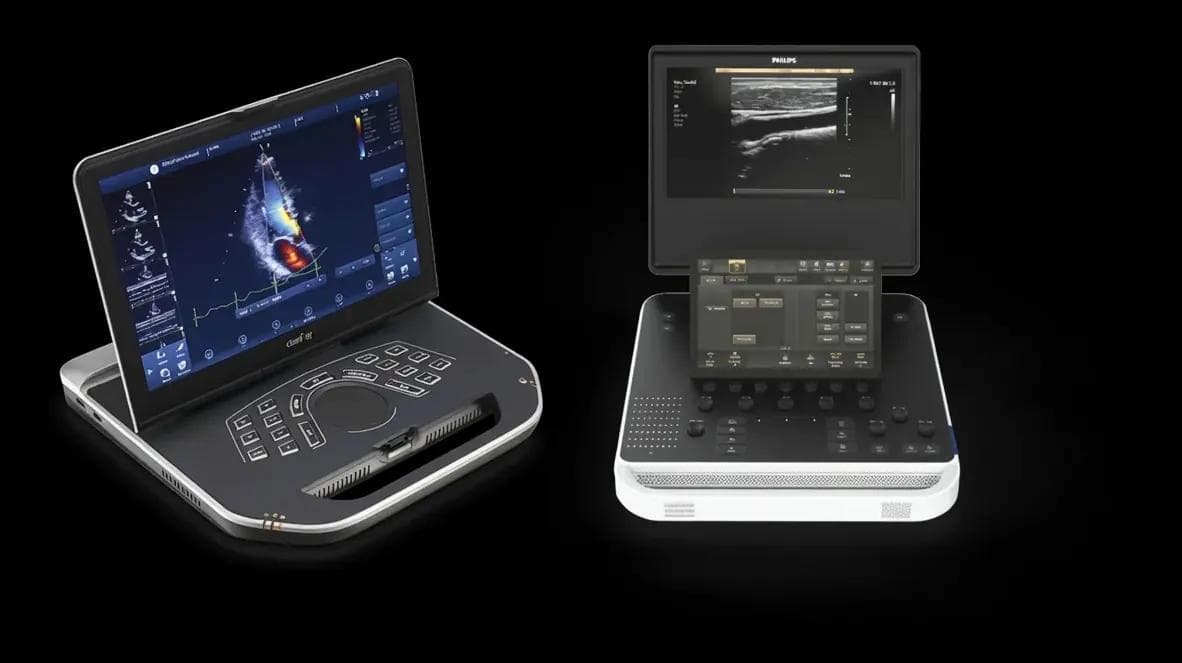 GE Vivid iq and Philips 5000 Series portable ultrasound systems shown side by side.