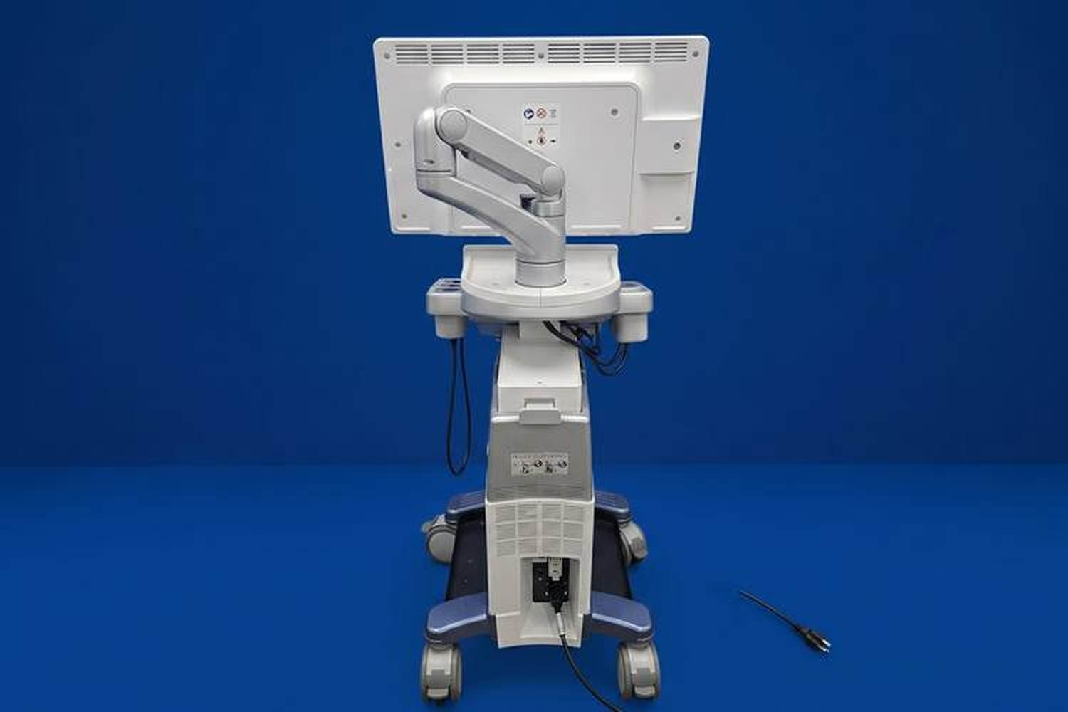 Rear of the GE LOGIQ P9 showing the monitor arm mount